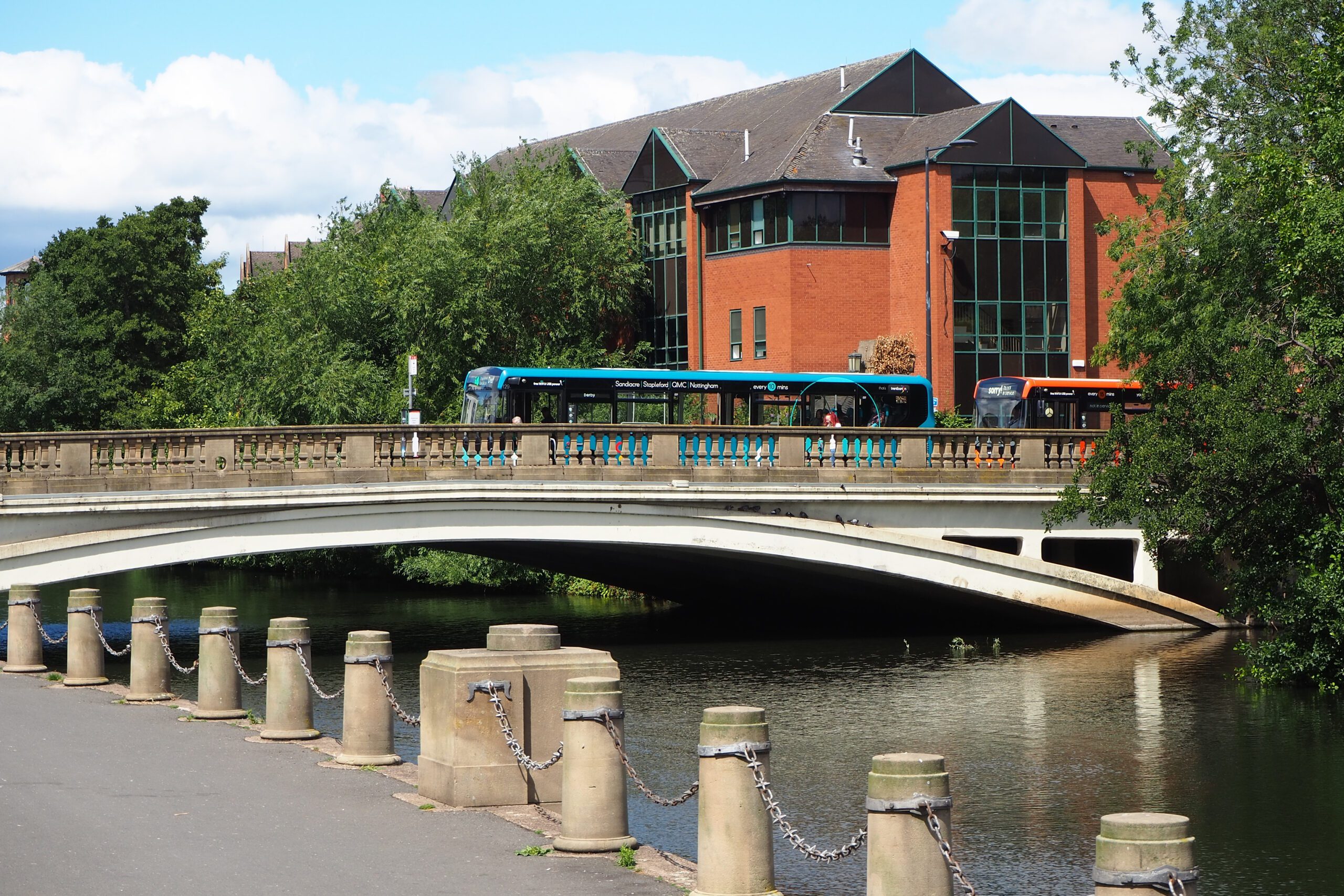 A bus crossing a bridge over the River Derwent in Derby